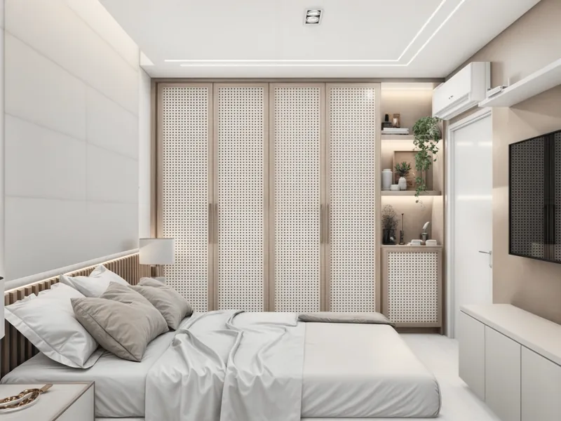 Quarto de casal com guarda-roupa em palhinha, iluminação embutida e paleta clara